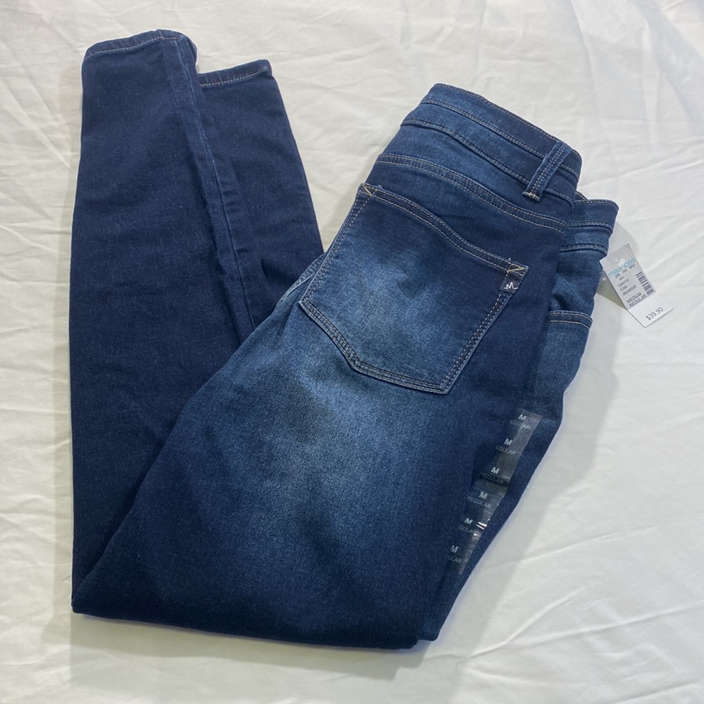 Woman’s mid rise Jeggings size Med NWT